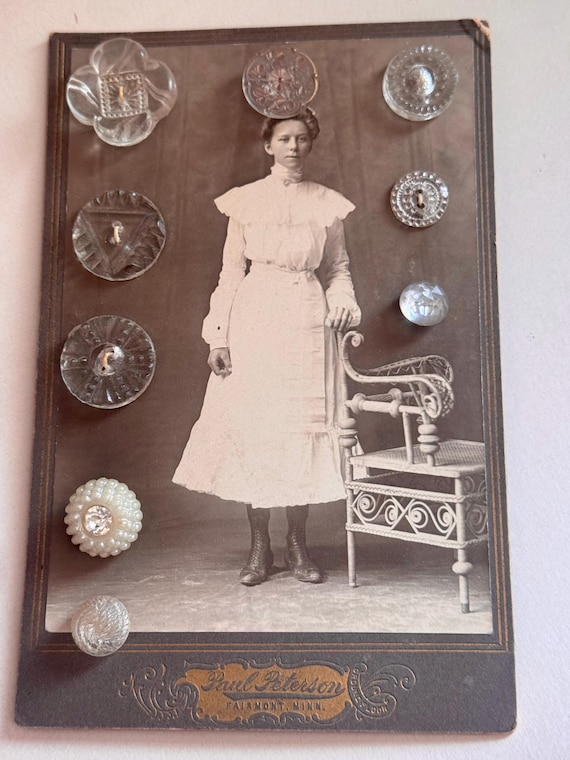 Antique cabinet card with glass buttons