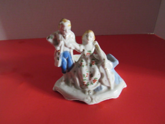 Colonial Couple pin holder figurine with Cello