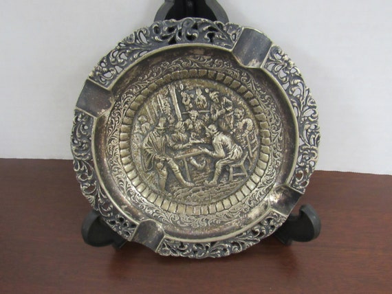 Nickel silver round ashtray with men playing cards
