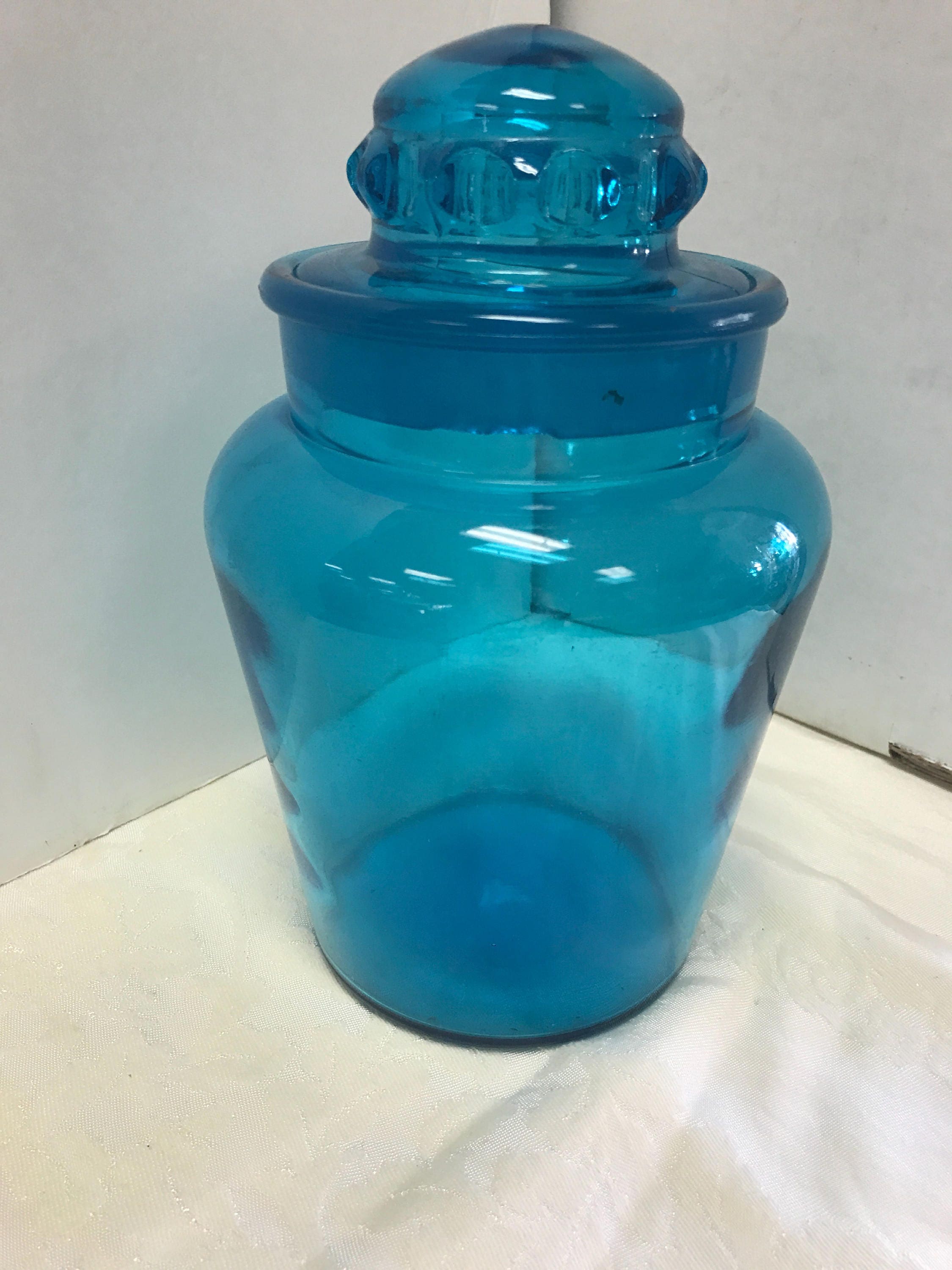 Blue apothecary jar with lid