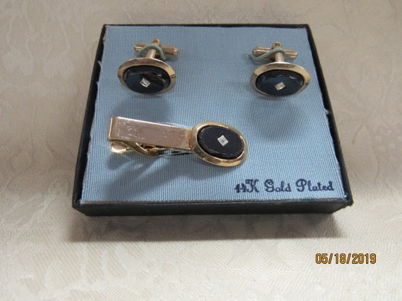 Vintage cufflinks and tie clasp