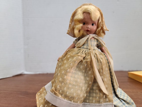 Nancy Ann storybook doll blonde hair 5"bisque 1940's in original outfit.