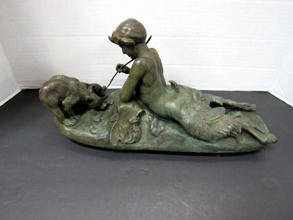 Sculpture "Pan and the Bear Cubs"