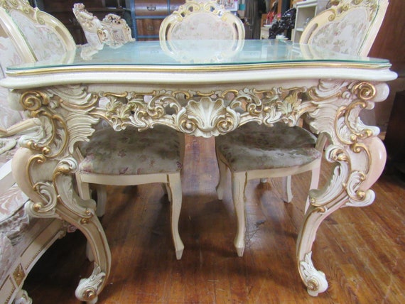 Italian dining table and chairs by Silik