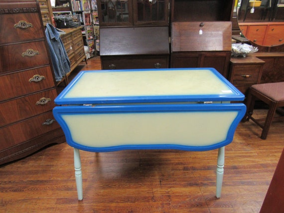 Drop leaf dining table with metal top