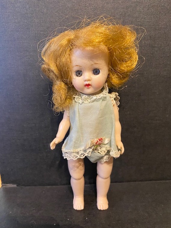 Vintage hard plastic doll