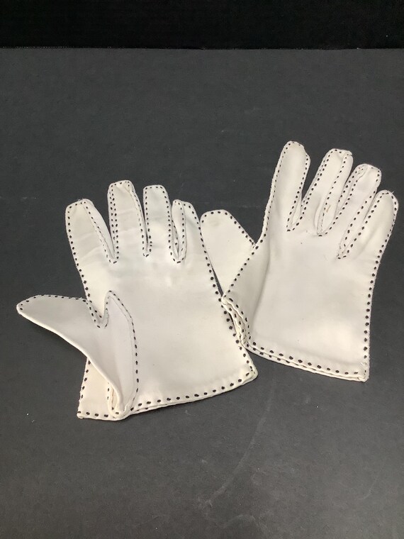 White cotton gloves Black stitching