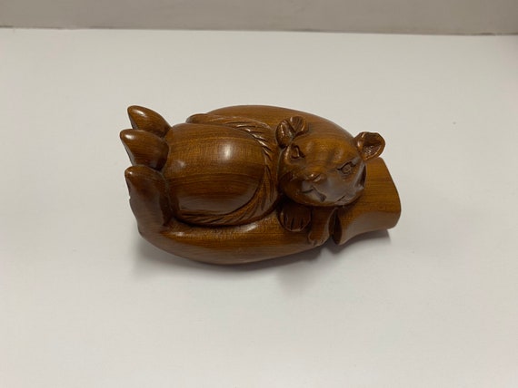 Wooden Carved Hand Holding Mouse