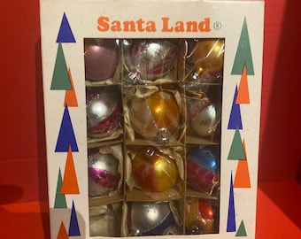 Vintage Christmas ornaments by Santa Land