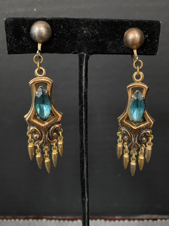 Turquoise Stone Dangling Gold Claws