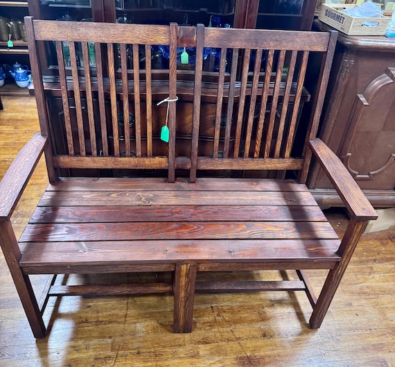 Oak bench with arms