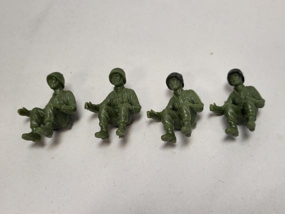4 sitting G.I.'S