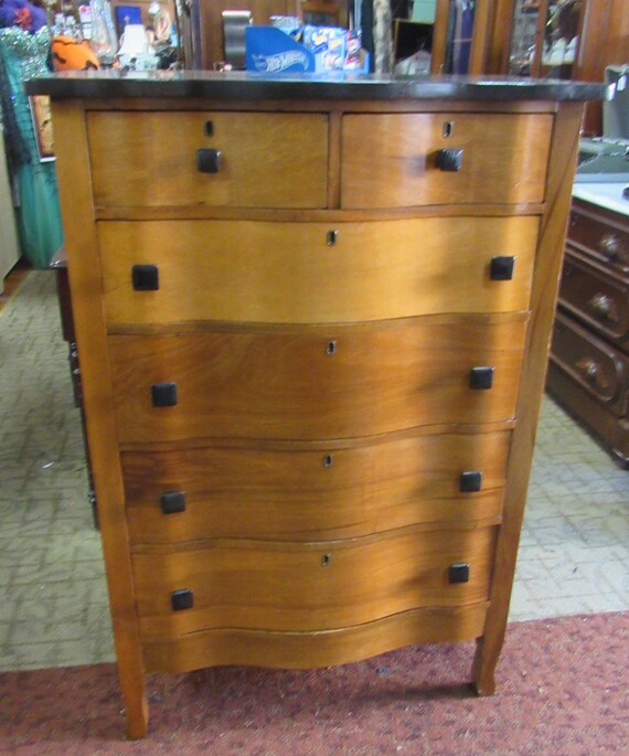 Highboy dresser with serpentine front