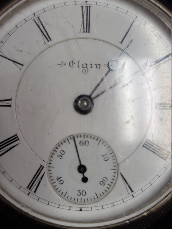 Elgin pocket watch.