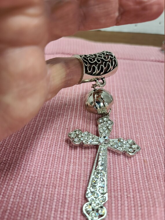 Pinky Finger Cross