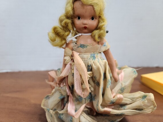 Nancy Ann storybook doll blonde hair 5"bisque 1940's in original outfit.