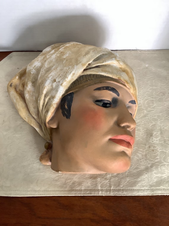 Bust of stoic woman