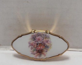 Clip para pintalabios Stratton con espejo