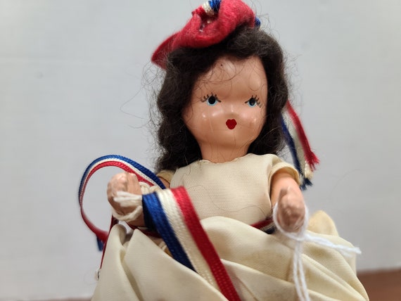 Nancy Ann storybook doll black hair 5"bisque 1940's in original outfit.