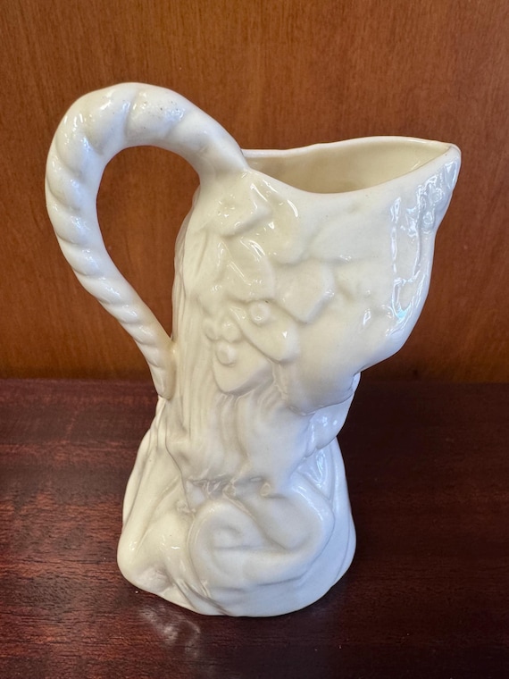 Belleek Kneeling Girl Creamer