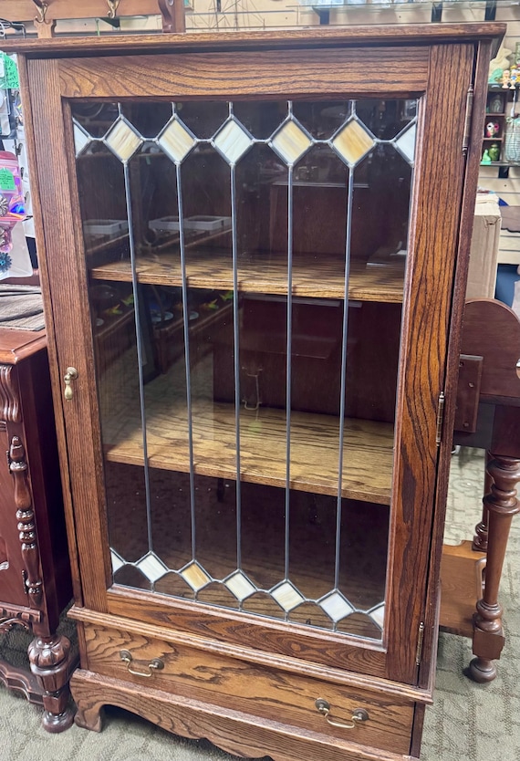 Curio cabinet with leaded glass