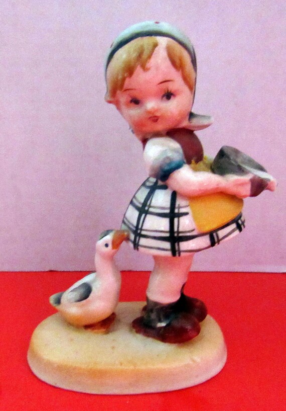 Occupied Japan girl figurine with duck