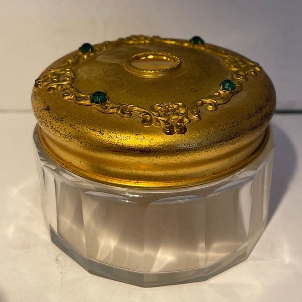 Glass hair receiver with brass lid