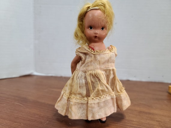 Nancy Ann storybook doll blonde hair 5"bisque 1940's in original outfit.