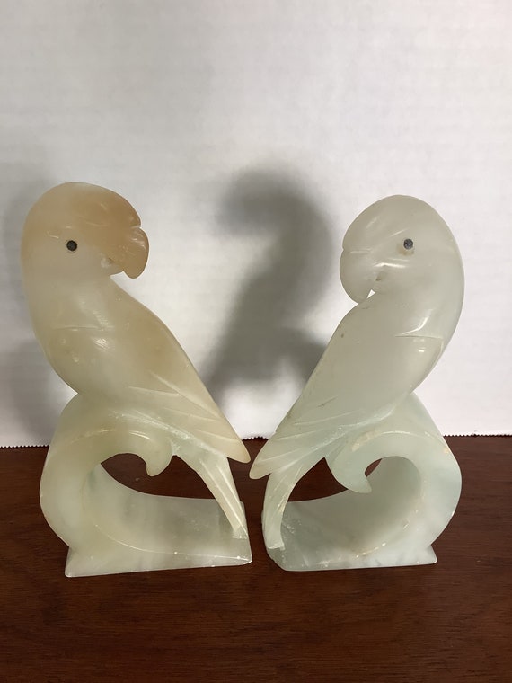 Pair of alabaster parrots
