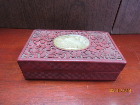 Red laquer trinket box with jade insert