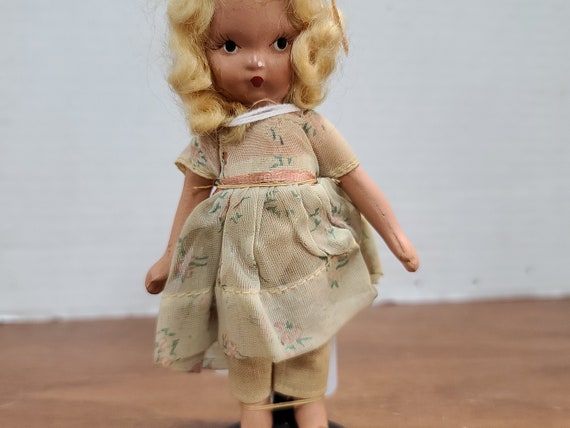 Nancy Ann storybook doll blonde hair 5"bisque 1940's in original outfit.