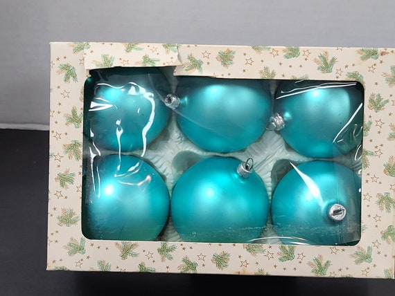 Teal glass Christmas ornaments in box