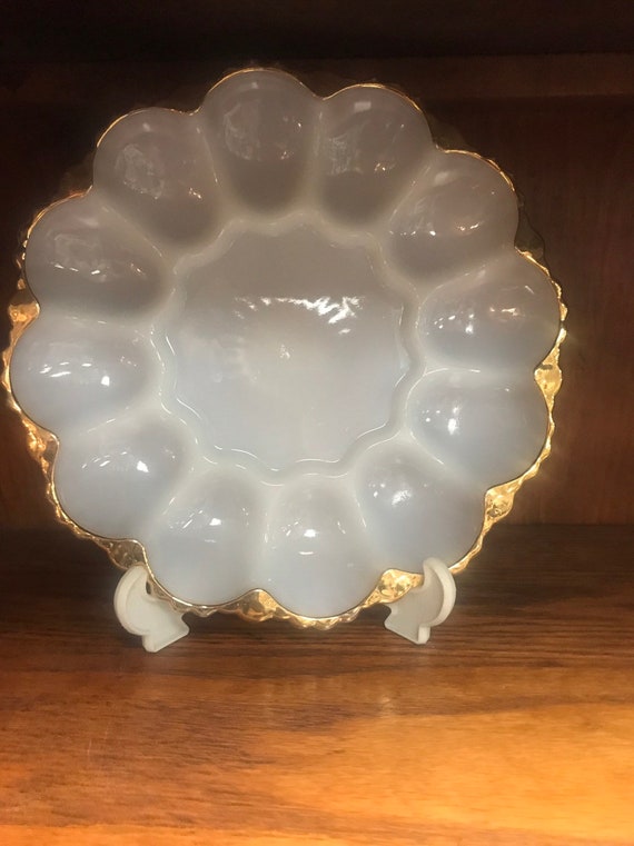 Milk glass deviled egg serving dish with gold trim