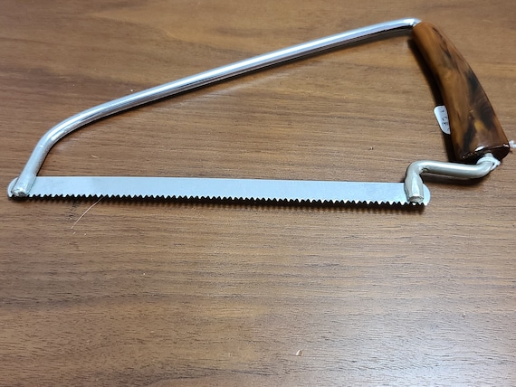 Bakelite butter scotch meat saw