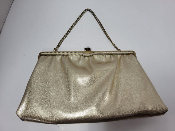Ande’s Metallic Rose Gold Clutch