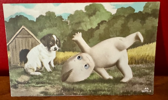 Kewpie postcard with googly eyes