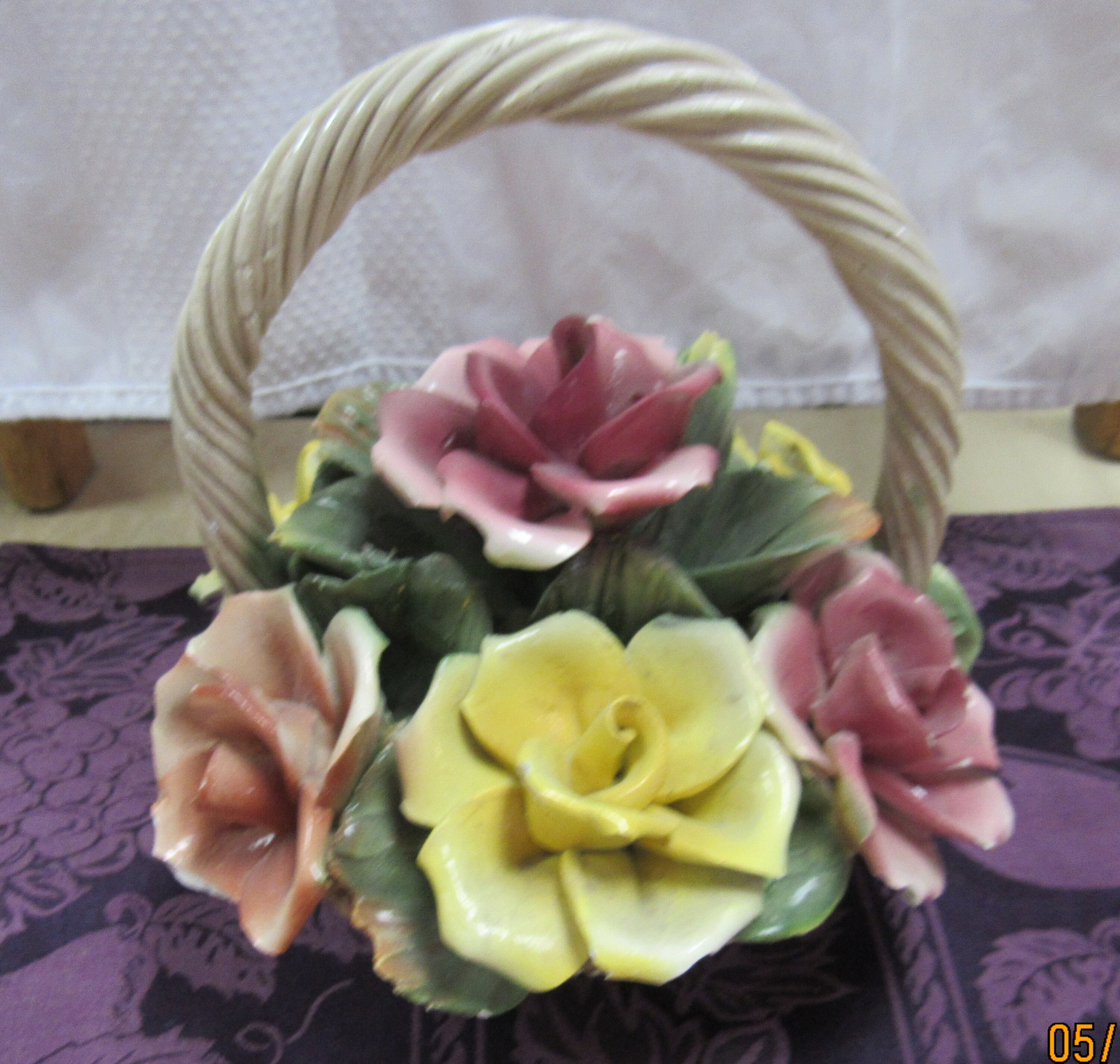 Capodimonte floral basket arrangement