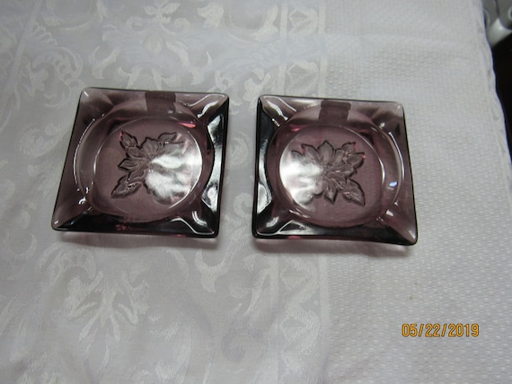 Pair of purple ashtrays