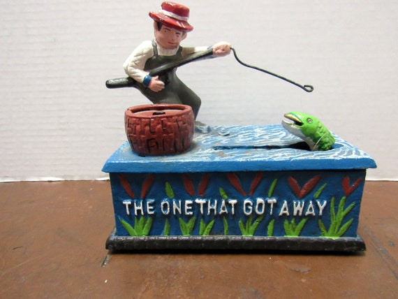 Cast Iron Bank with fisherman