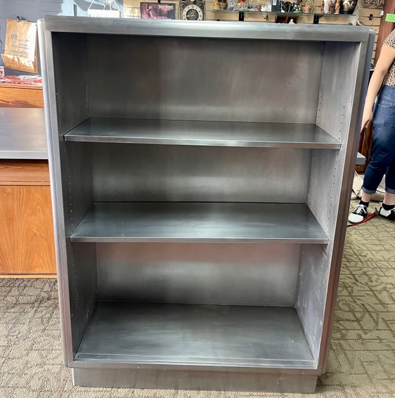 Brushed steel bookshelf