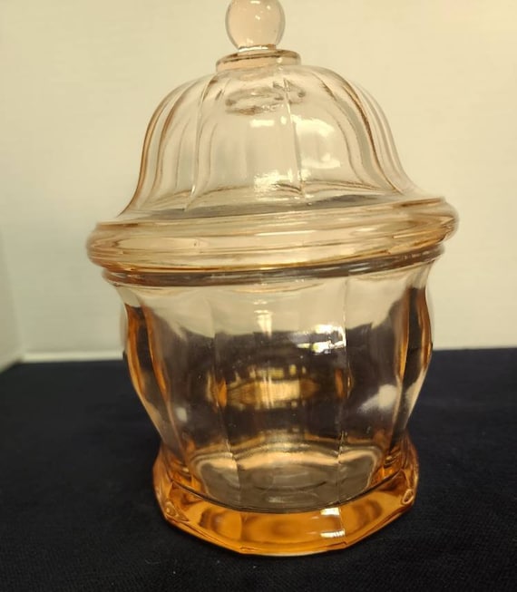 Pink glass paneled biscuit jar