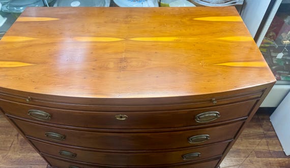 Hekel serpentine dresser with pull out front