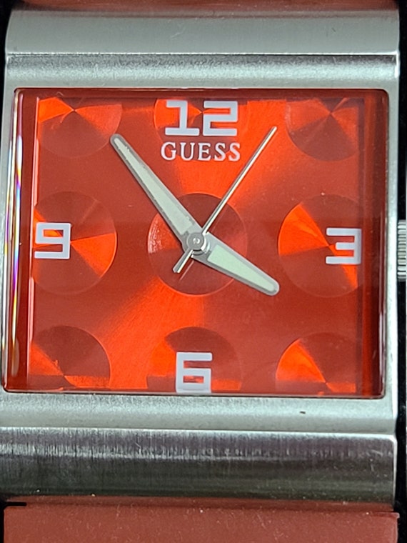 Guess woman's wristwatch.