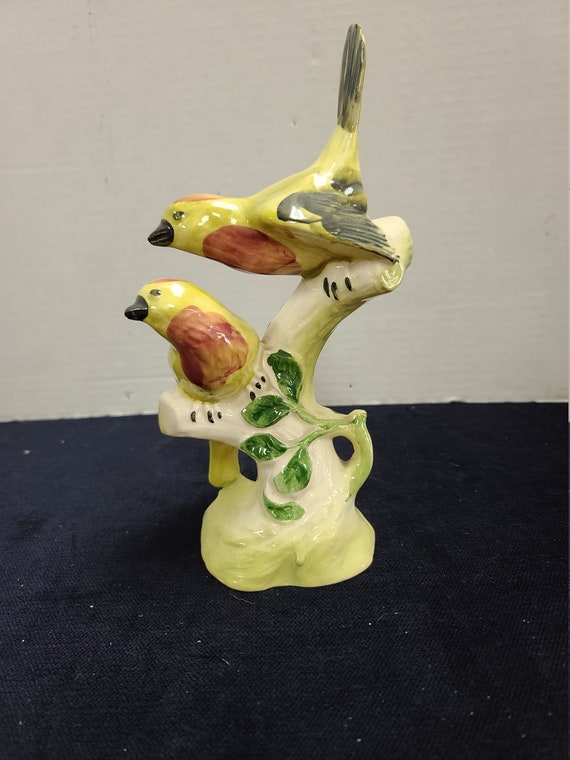 Bird on a porch figurine