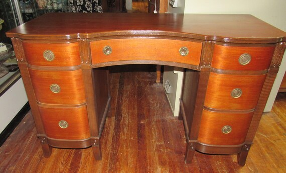 Cherry wood desk with seven drawers