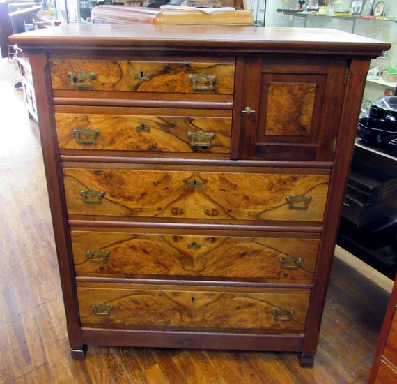 Antique tall dresser with burl wood