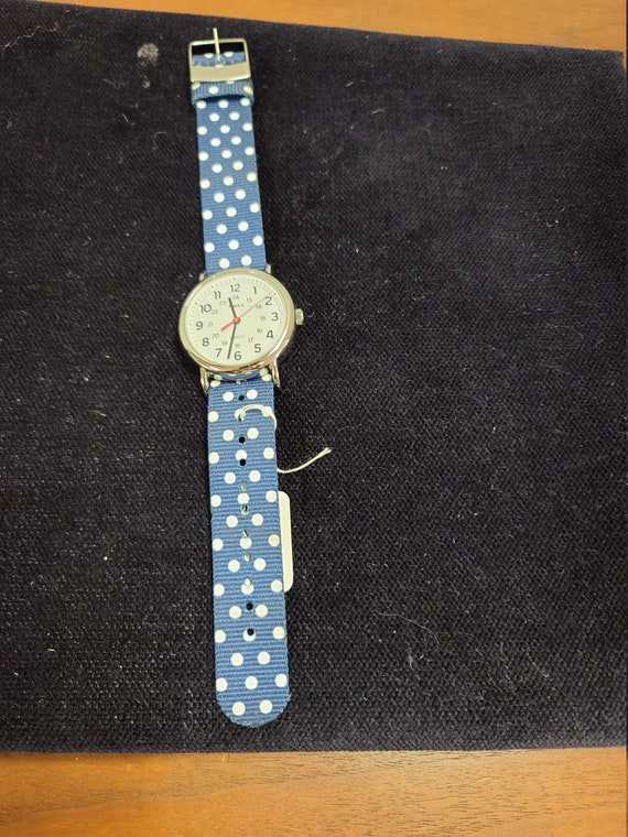 Timex with blue and white dot band Indiglo wristwatch