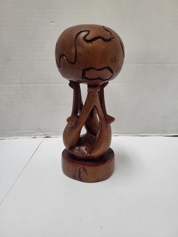 Hand-carved wooden African Unity Globe
