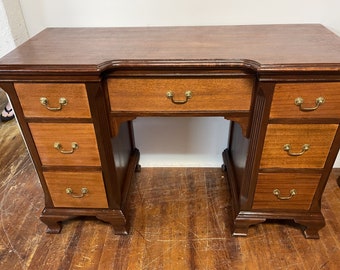Mahogany Desk with seven drawers