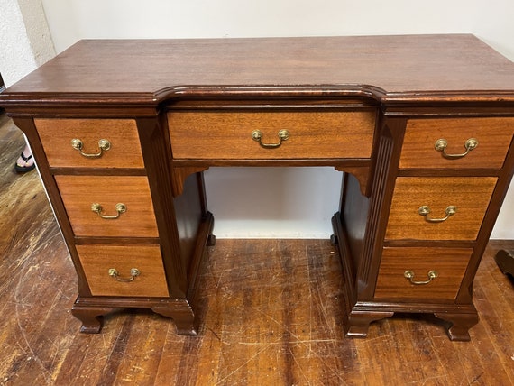 Mahogany Desk with seven drawers